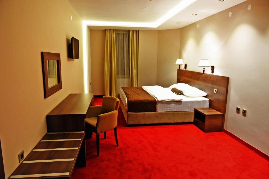 Postel nebo postele na pokoji v ubytování Hotel Bavka