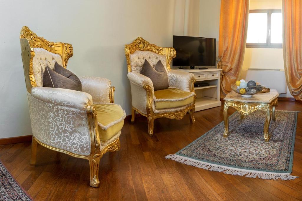 Telewizja i/lub zestaw kina domowego w obiekcie Appartamento Il Campo