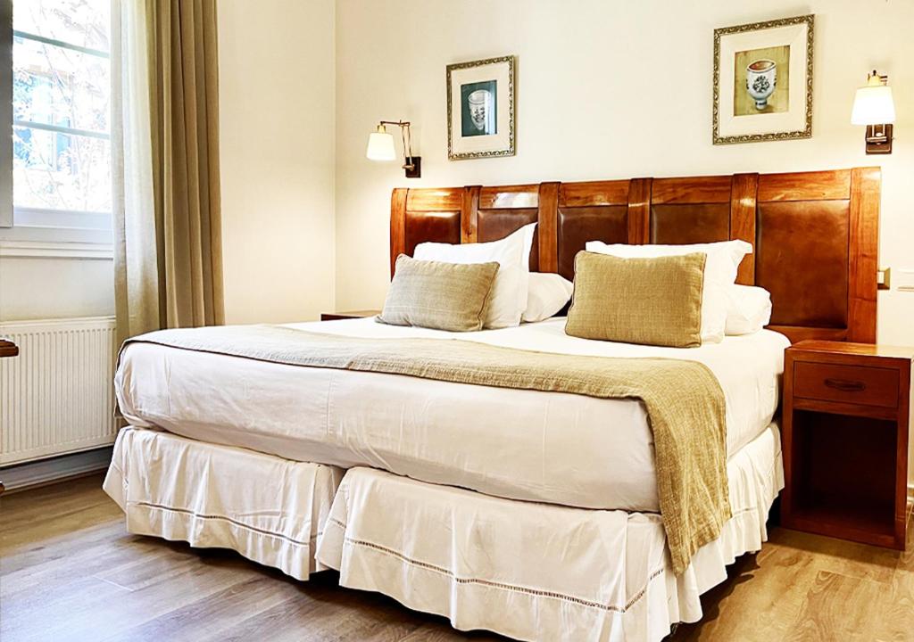 Postel nebo postele na pokoji v ubytování Termas de Jahuel Hotel & Spa