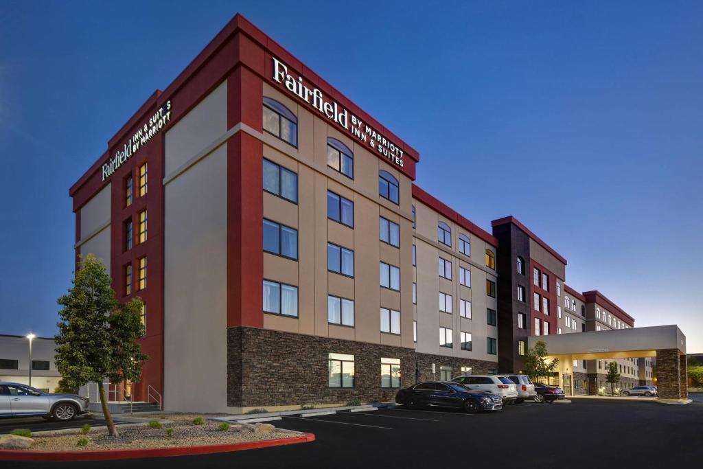 a rendering of a hotel with cars parked in a parking lot at Fairfield Inn & Suites Las Vegas Airport South in Las Vegas
