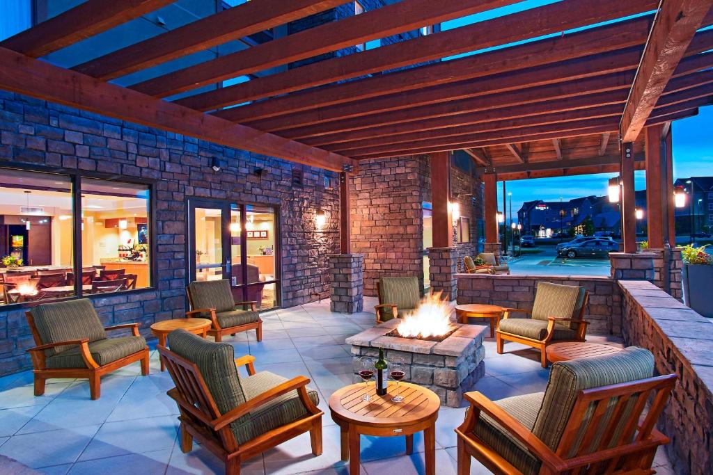 a patio with chairs and a fire pit at TownePlace Suites by Marriott Billings in Billings
