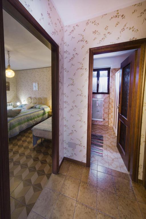 Postel nebo postele na pokoji v ubytování B&B IL GERLO
