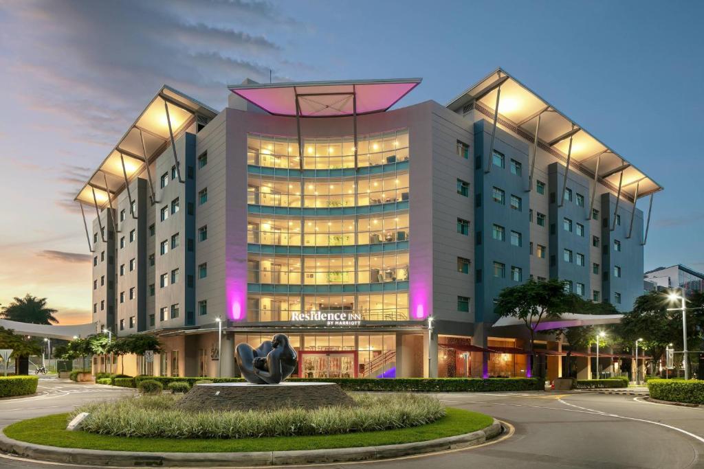 a rendering of a building with a statue in front of it at Residence Inn by Marriott San Jose Escazu in San José