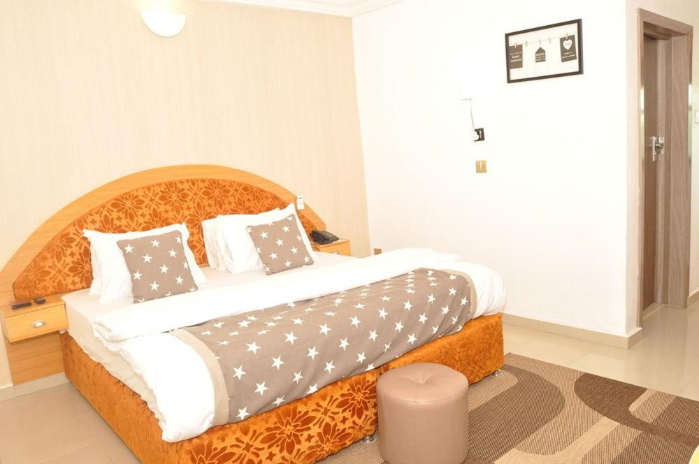 Postel nebo postele na pokoji v ubytování Ne-yo hotel & rv lodges