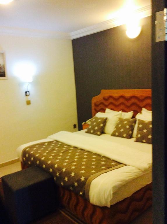 Postel nebo postele na pokoji v ubytování Ne-yo hotel & rv lodges
