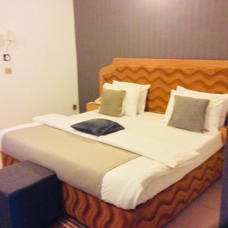 Postel nebo postele na pokoji v ubytování Ne-yo hotel & rv lodges