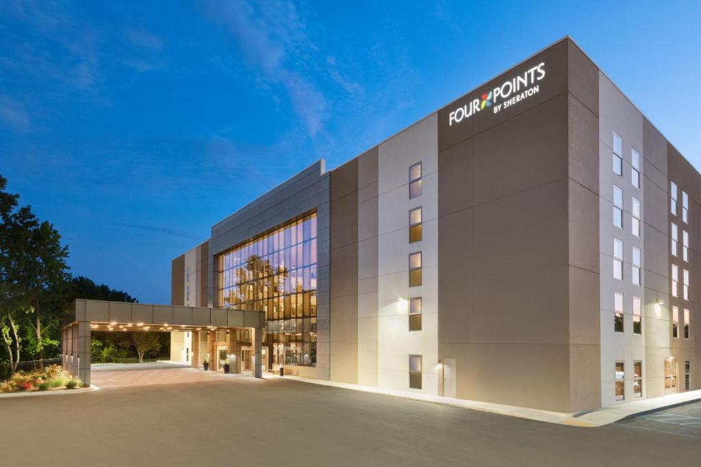 a rendering of the front of a building at Four Points by Sheraton Spartanburg in Spartanburg