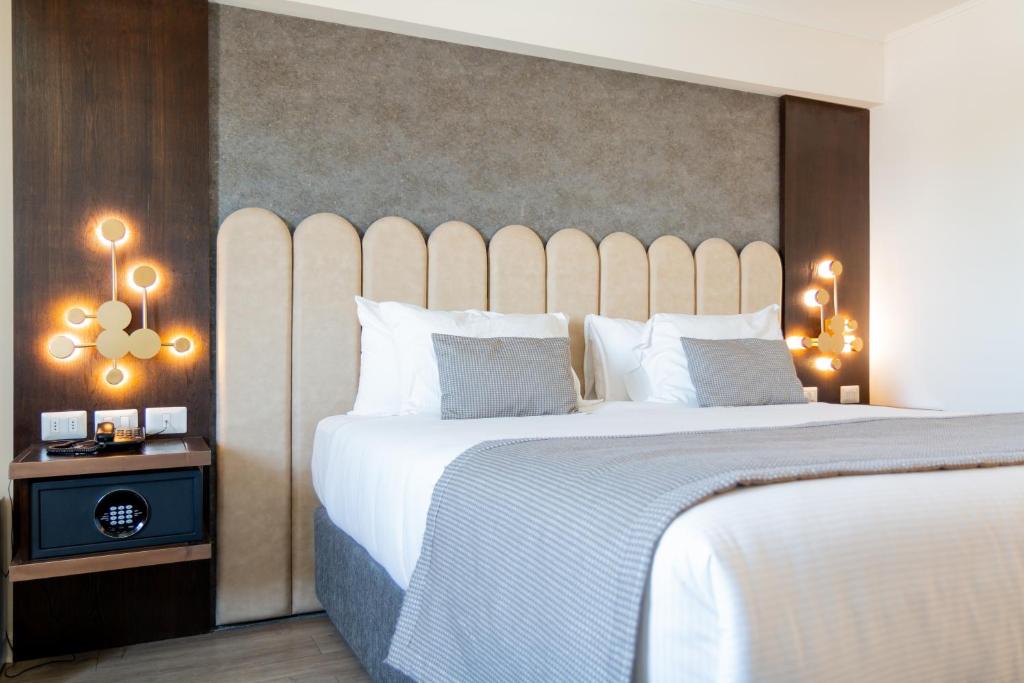 Postel nebo postele na pokoji v ubytování Hotel HW High Wellness