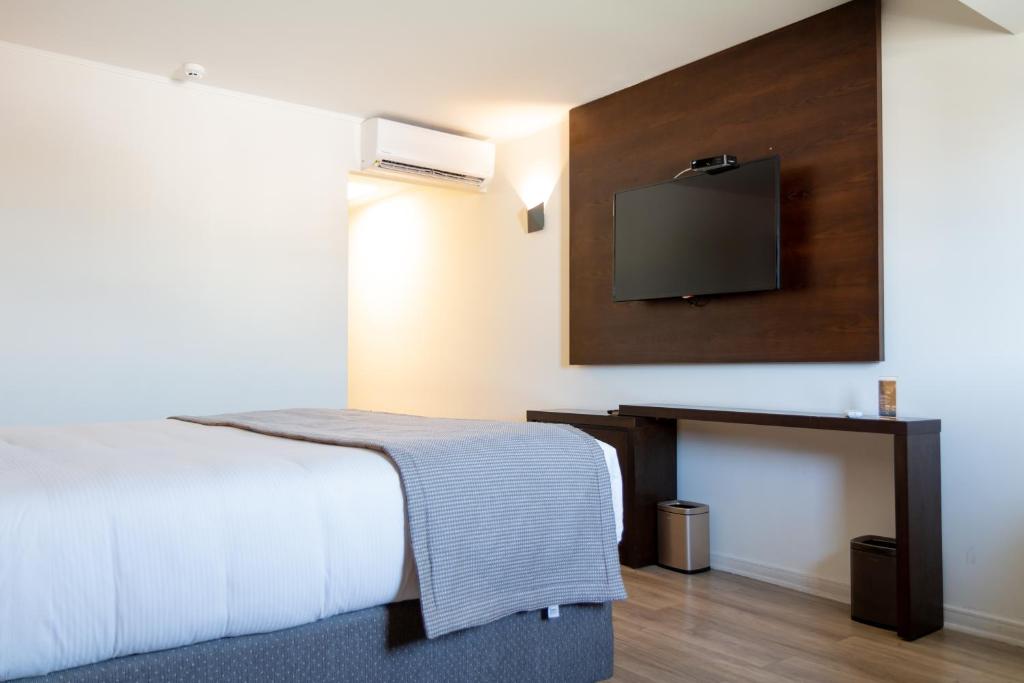 TV a/nebo společenská místnost v ubytování Hotel HW High Wellness