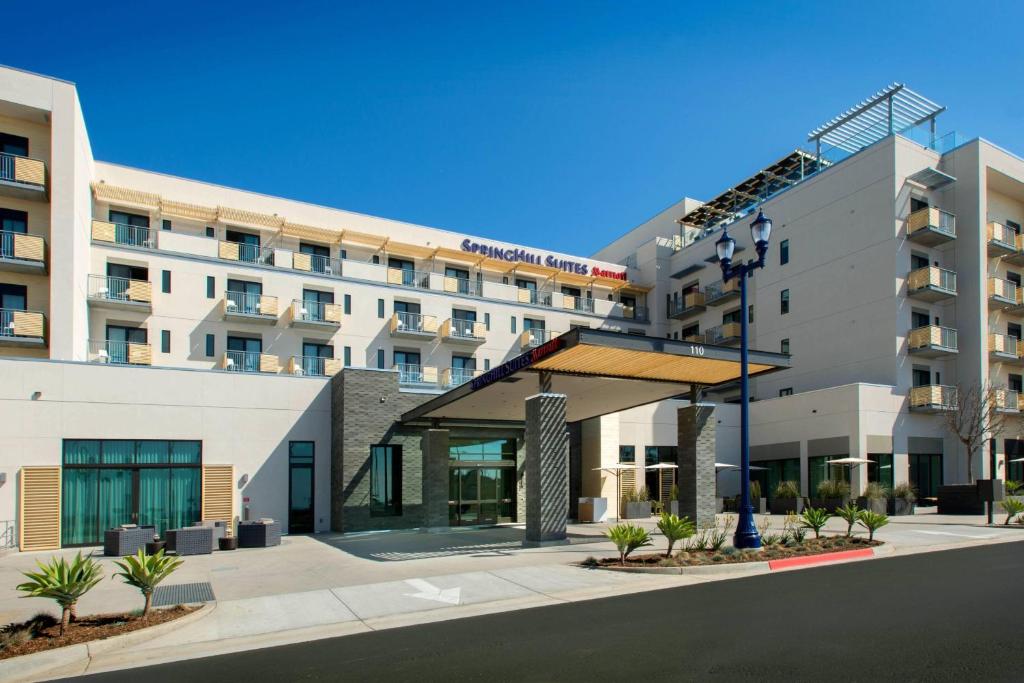 a rendering of the front of a hotel at SpringHill Suites by Marriott San Diego Oceanside/Downtown in Oceanside