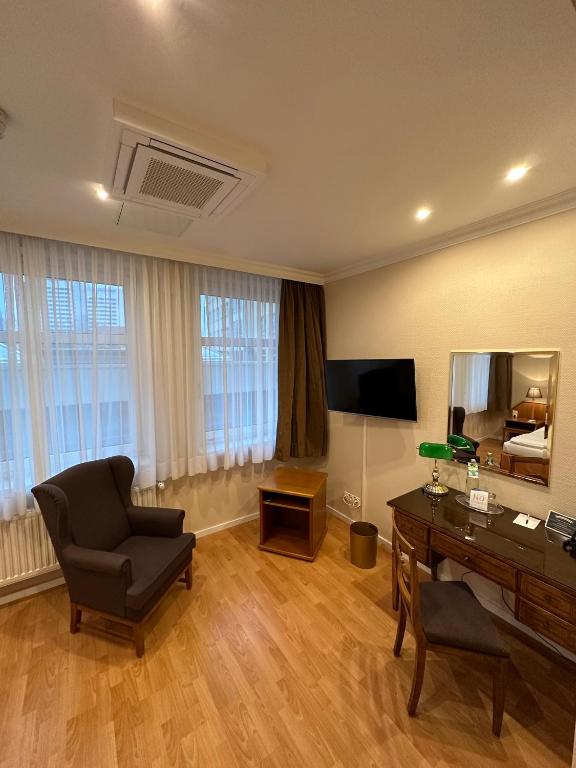 TV a/nebo společenská místnost v ubytování Hotel Ratswaage