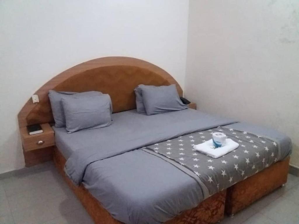 Postel nebo postele na pokoji v ubytování Ne-yo hotel & rv lodges