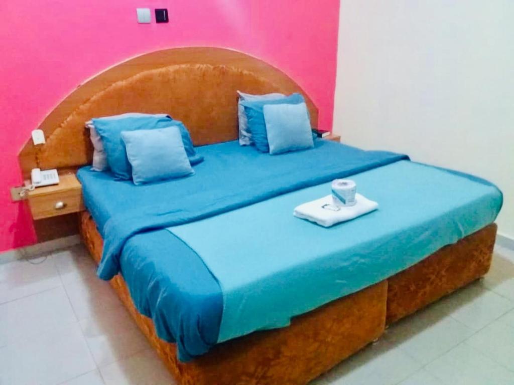 Postel nebo postele na pokoji v ubytování Ne-yo hotel & rv lodges