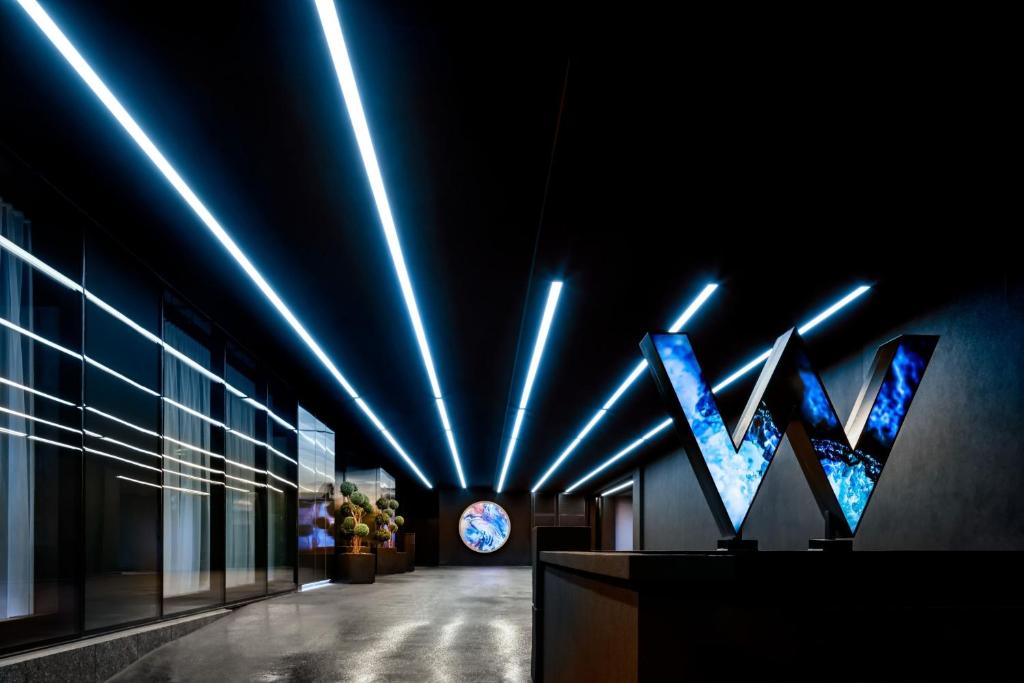 a building with a sign that says vwx on the wall at W Toronto in Toronto