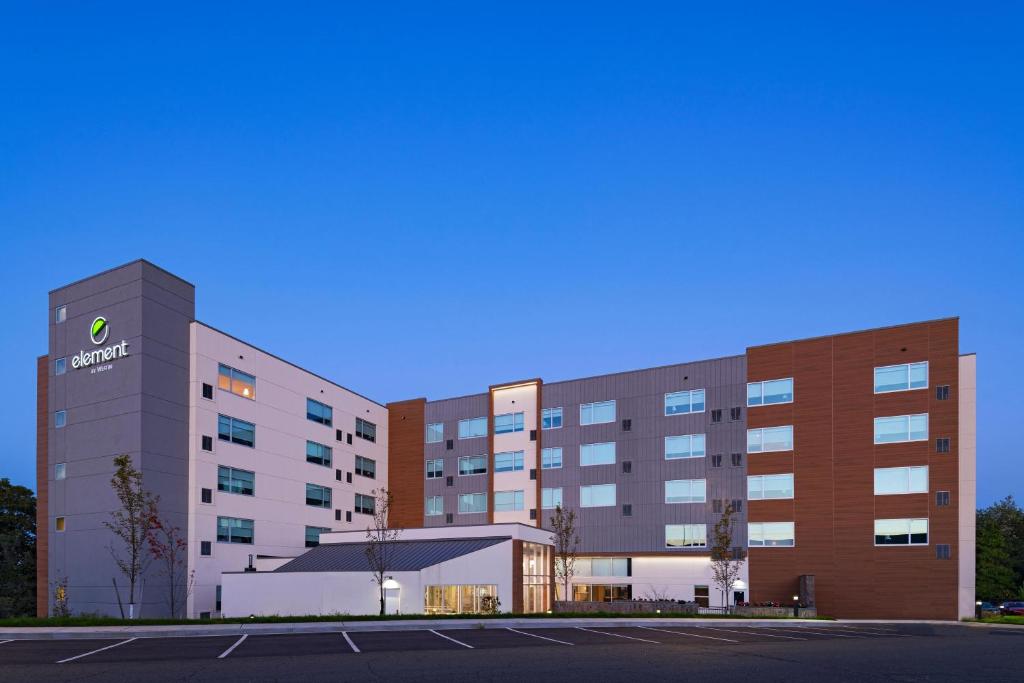 a rendering of a hospital building with a parking lot at Element Spring Valley in Spring Valley