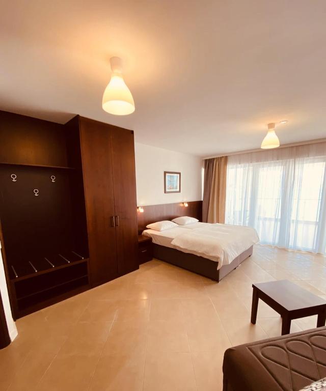 Postel nebo postele na pokoji v ubytování Hotel Vienna