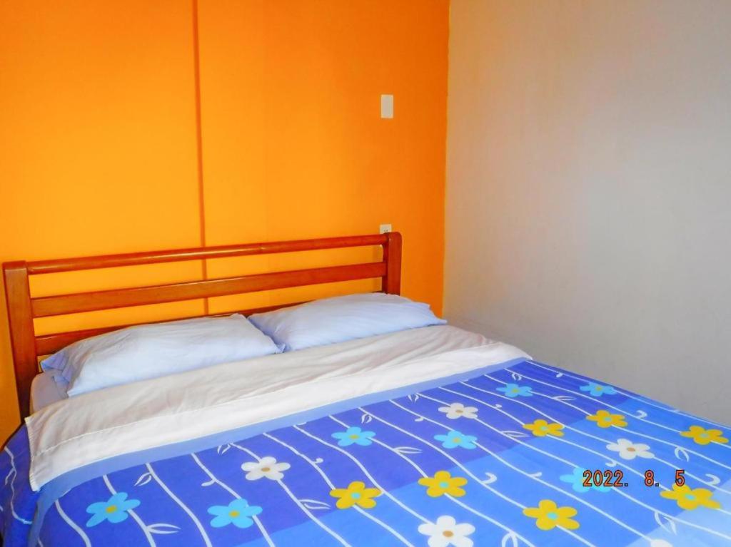 Postel nebo postele na pokoji v ubytování Hostal Timara