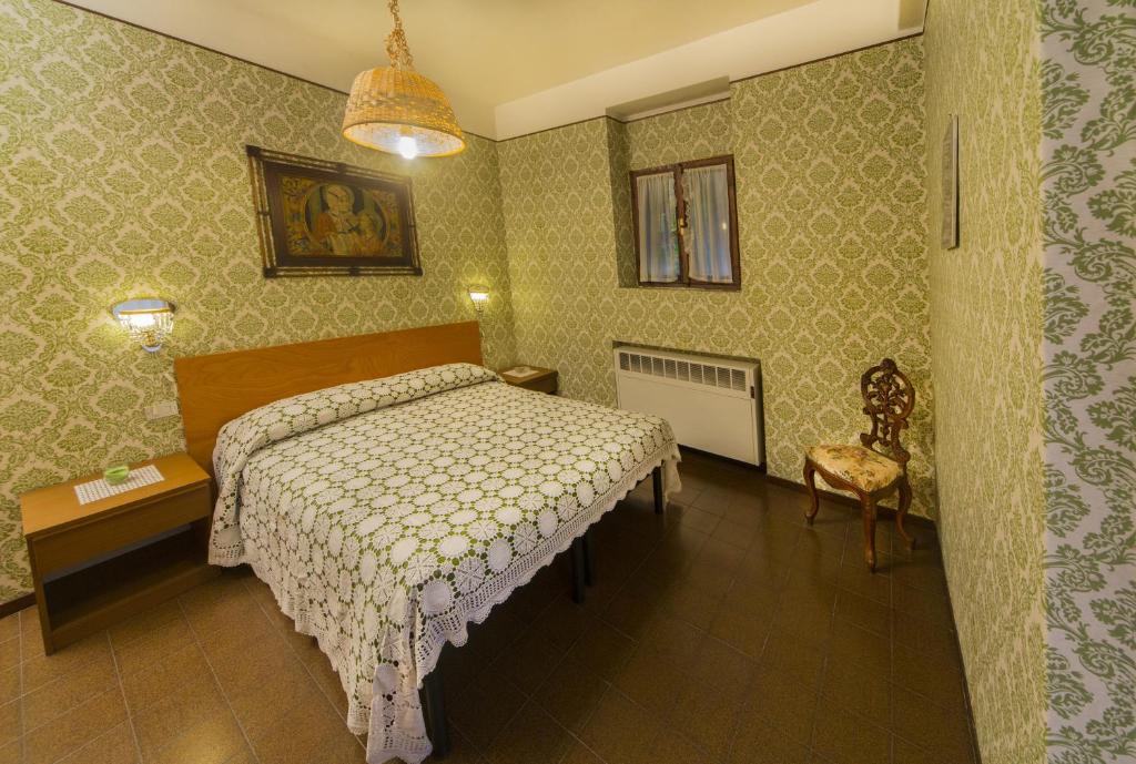 Postel nebo postele na pokoji v ubytování B&B IL GERLO