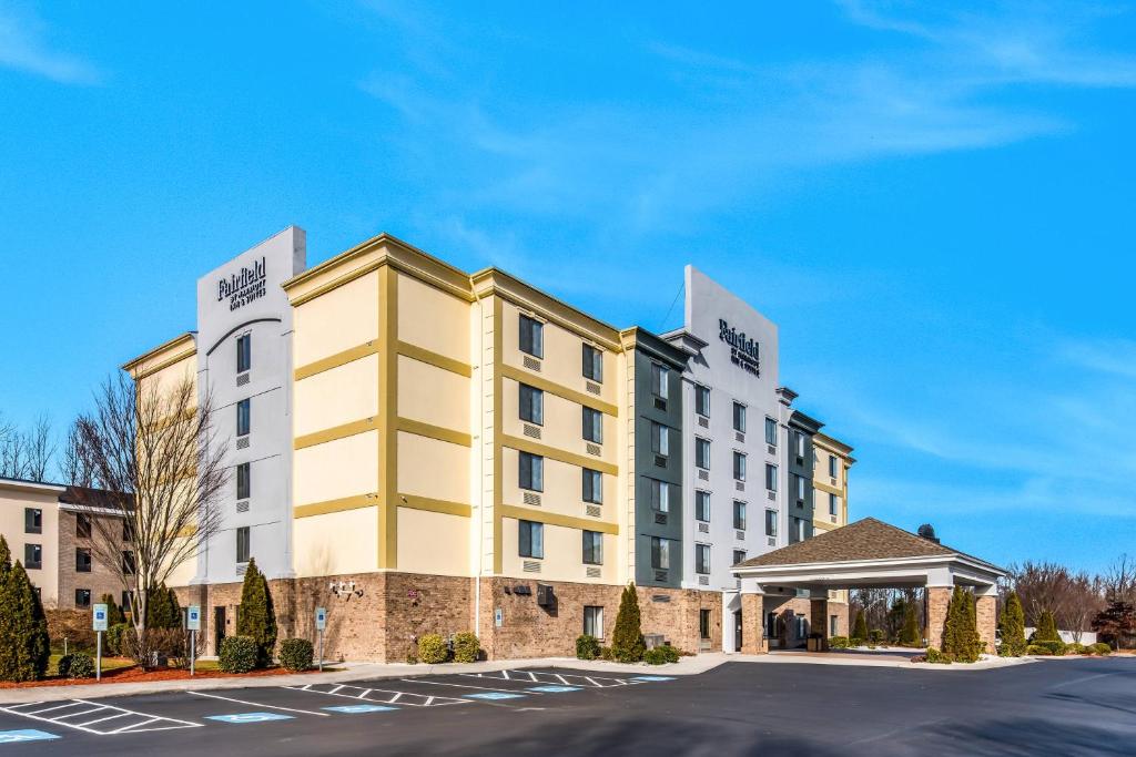 a rendering of the exterior of a hotel at Fairfield by Marriott Inn & Suites Greensboro Coliseum Area in Greensboro