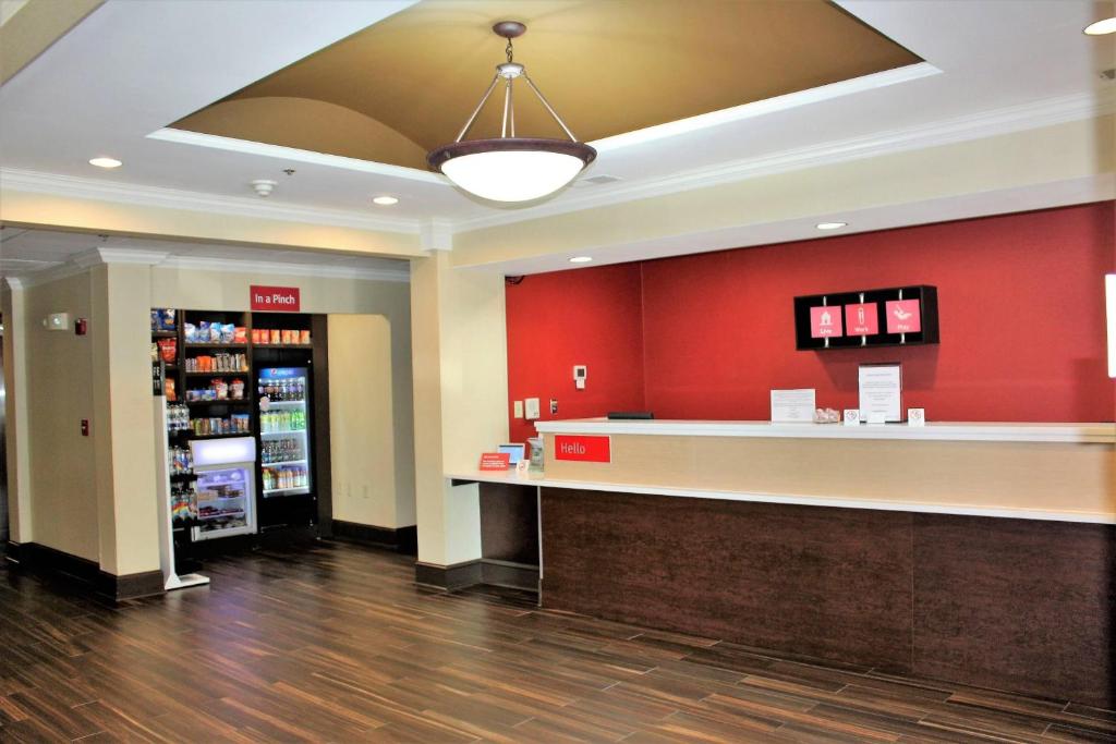 a store lobby with a cash counter and a pharmacy at TownePlace Suites Wilmington Newark / Christiana in Newark