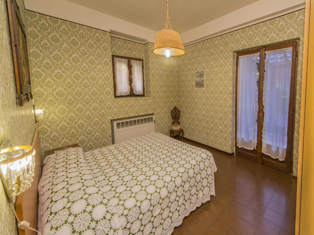 Postel nebo postele na pokoji v ubytování B&B IL GERLO