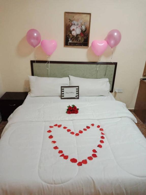 Postel nebo postele na pokoji v ubytování Apartment Teluk Batik