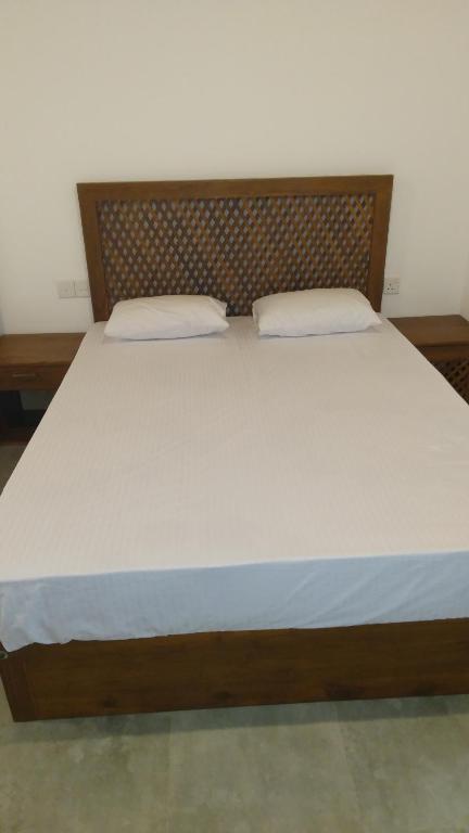 Postel nebo postele na pokoji v ubytování Serenity Villa Anuradhapura