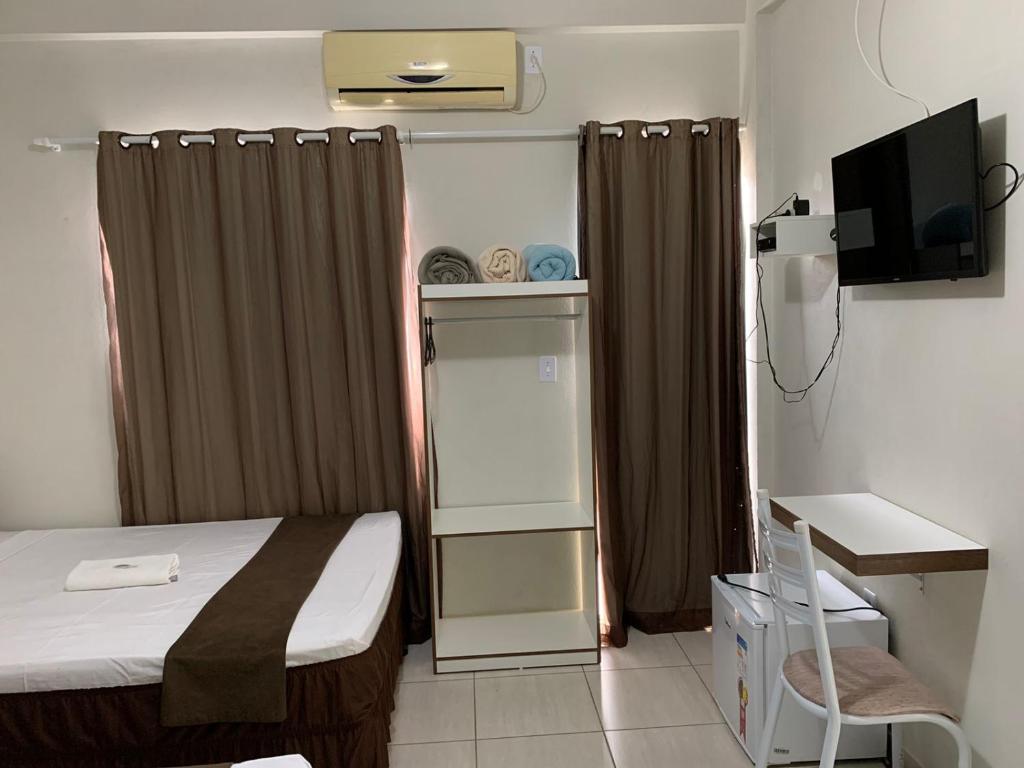 TV a/nebo společenská místnost v ubytování Hotel Alelos - Ituaçu Bahia