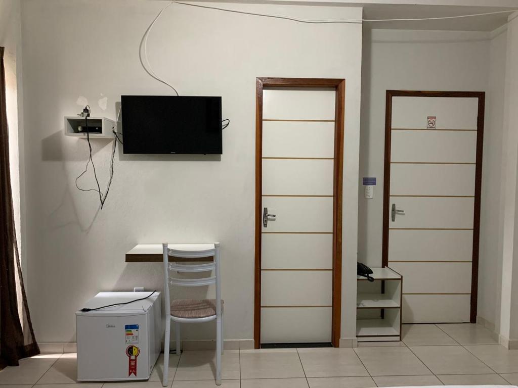 TV a/nebo společenská místnost v ubytování Hotel Alelos - Ituaçu Bahia