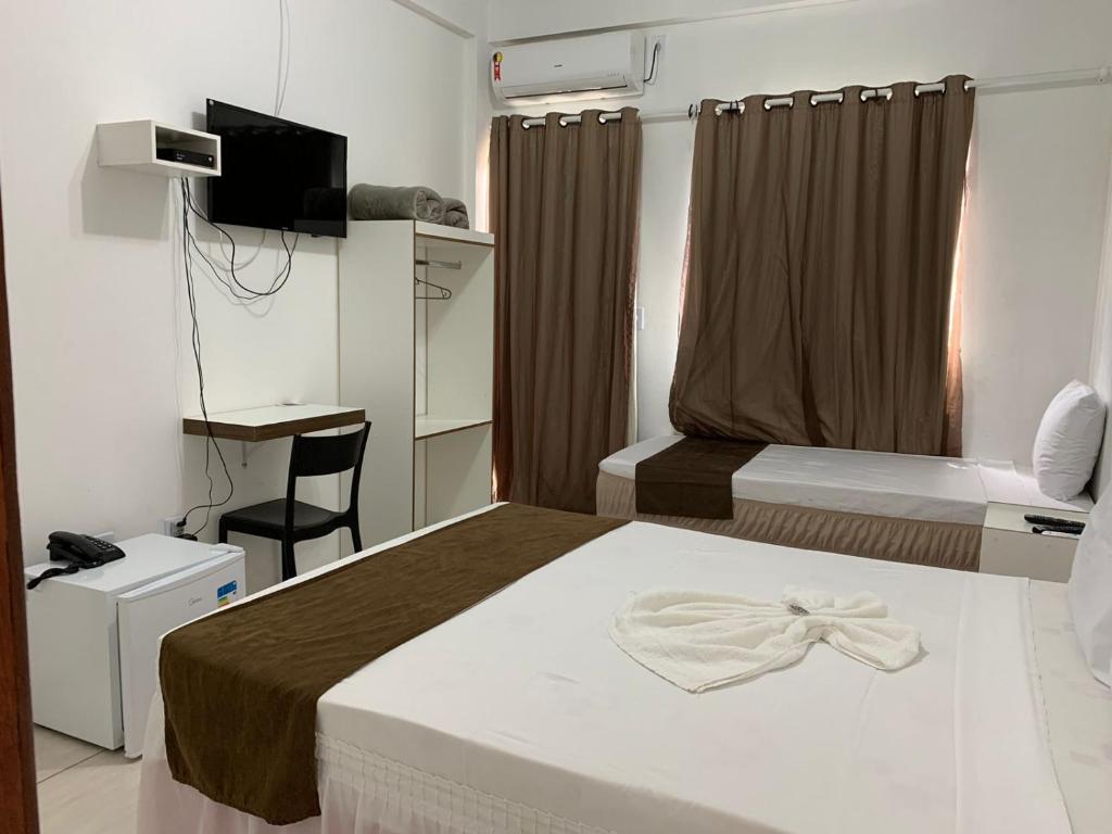 Postel nebo postele na pokoji v ubytování Hotel Alelos - Ituaçu Bahia