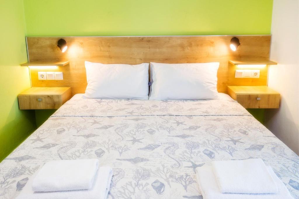 Postel nebo postele na pokoji v ubytování Marti Resort