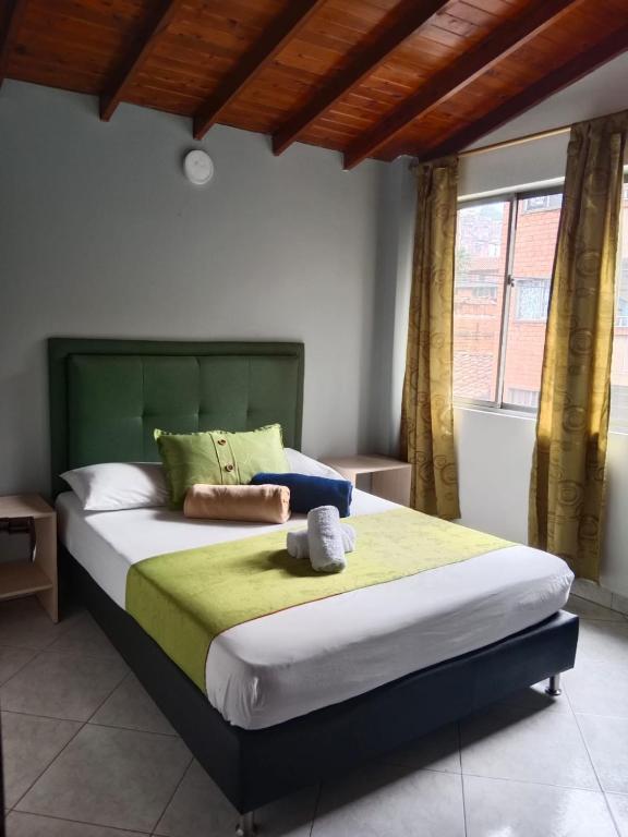 Postel nebo postele na pokoji v ubytování Hotel El Deportista