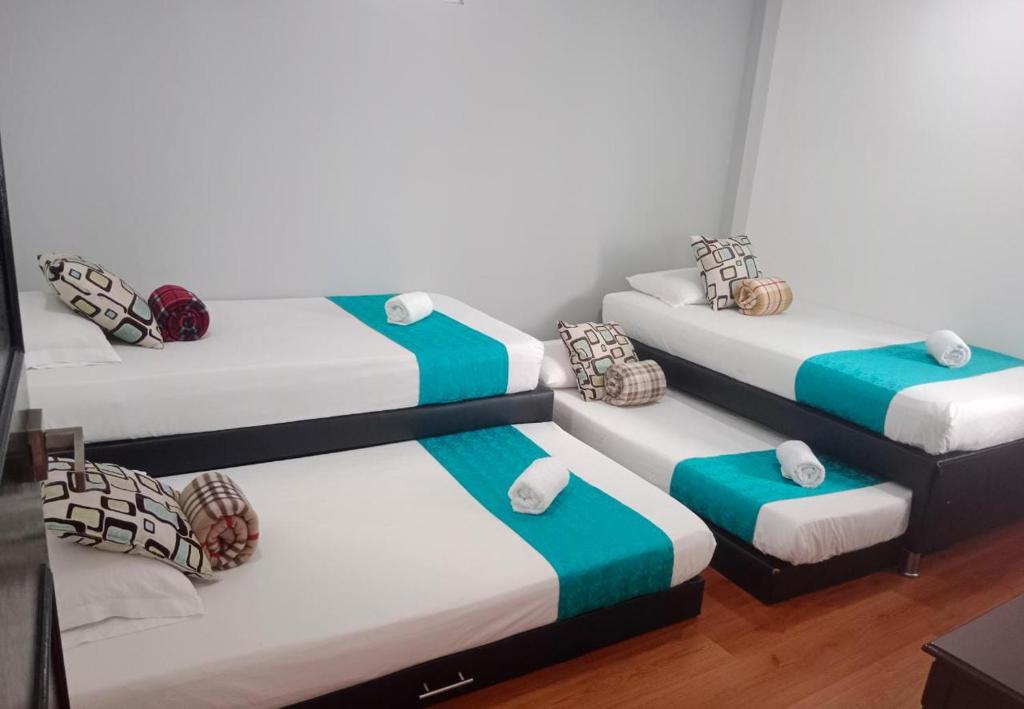 Postel nebo postele na pokoji v ubytování Hotel El Deportista