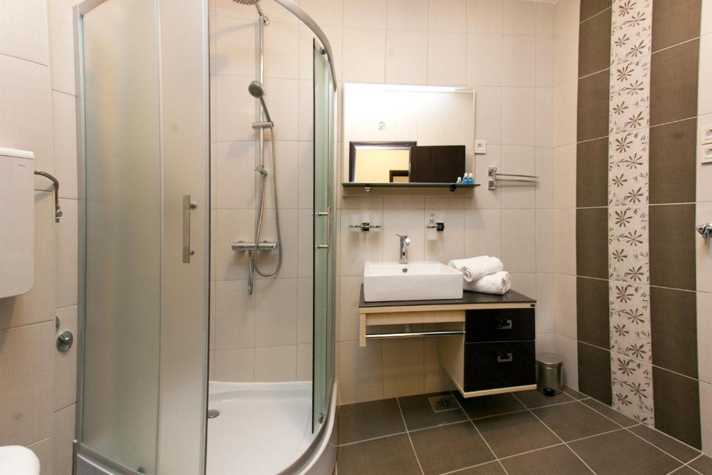 Koupelna v ubytování Guest House Aria