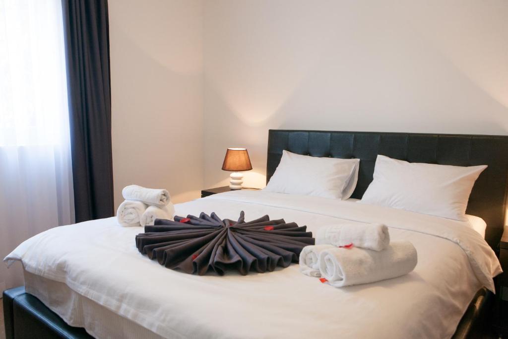 Postel nebo postele na pokoji v ubytování Guest House Aria