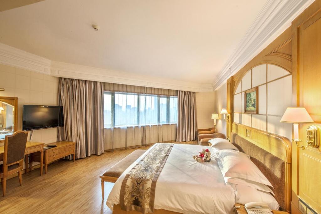 Postel nebo postele na pokoji v ubytování Hotel Silverland