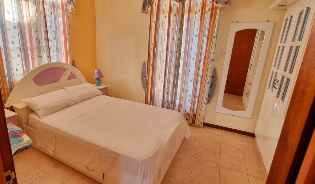 Postel nebo postele na pokoji v ubytování Residence Le Choisy