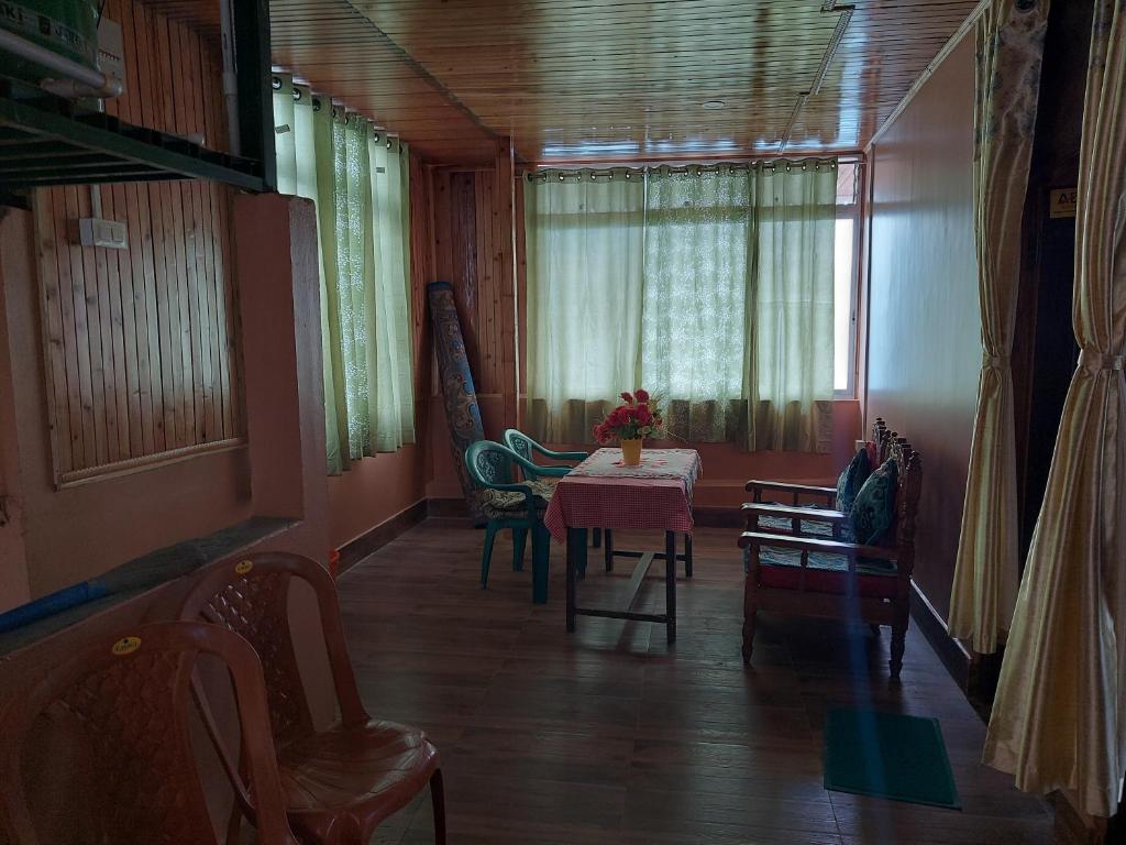 Posezení v ubytování Athithi homestay