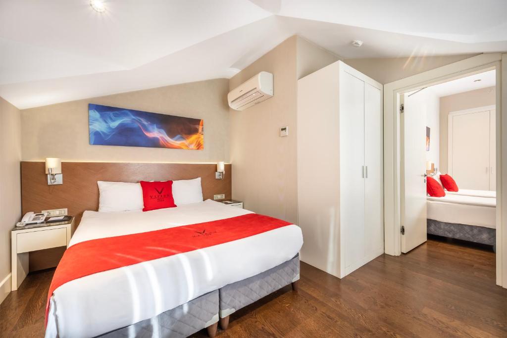 Postel nebo postele na pokoji v ubytování Veyron Hotels & SPA