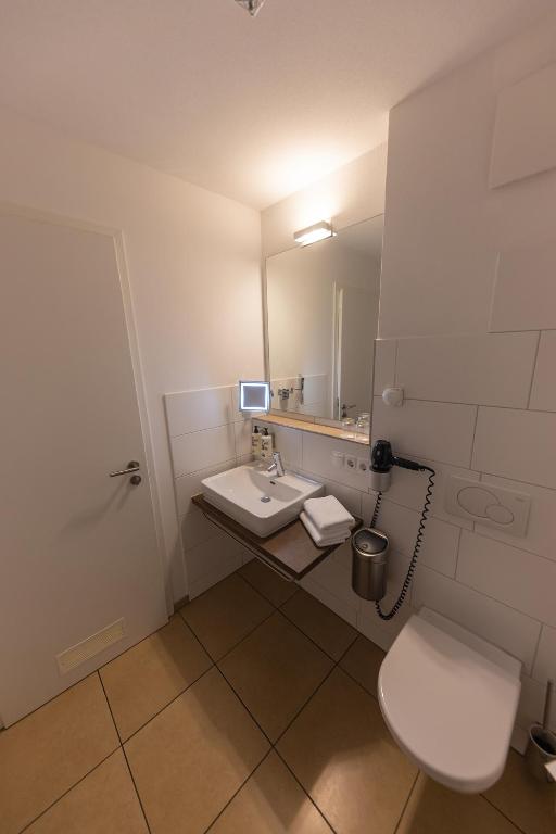 Koupelna v ubytování Boardinghouse HOME - adults only -