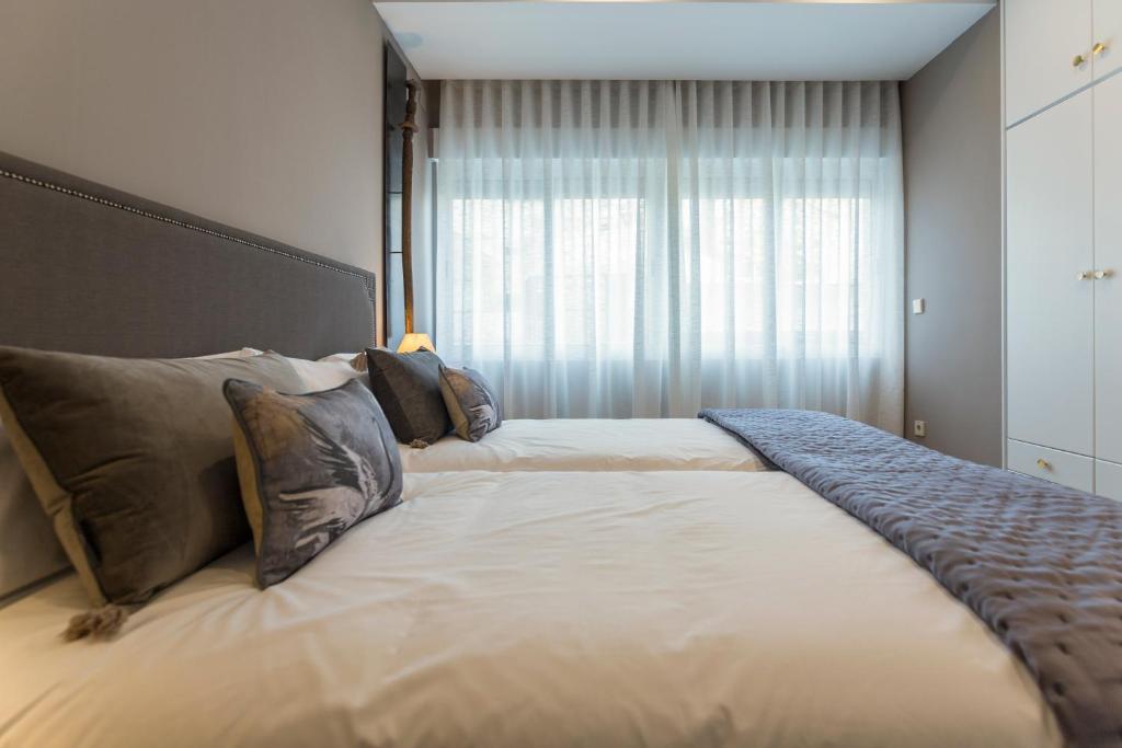 Posteľ alebo postele v izbe v ubytovaní Gran vivienda en la Rambla!