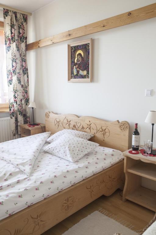 Posteľ alebo postele v izbe v ubytovaní Viva Maria Apartamenty