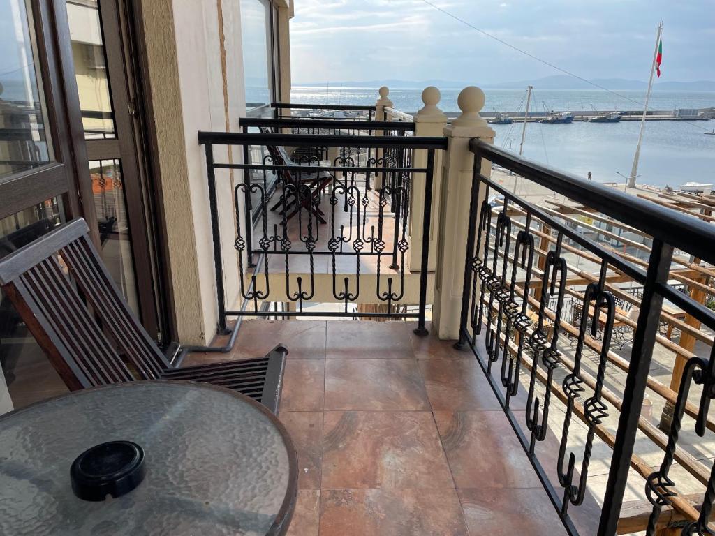 A balcony or terrace at At the American's Hotel