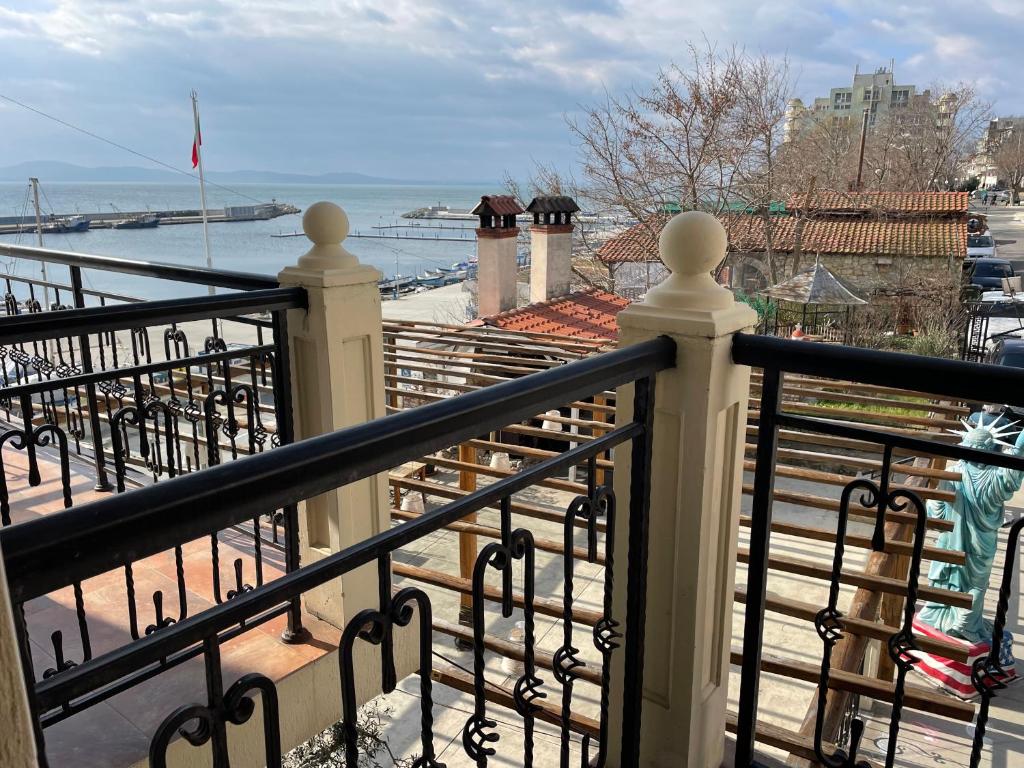 A balcony or terrace at At the American's Hotel