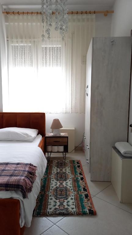 Postel nebo postele na pokoji v ubytování Isabel Rooms