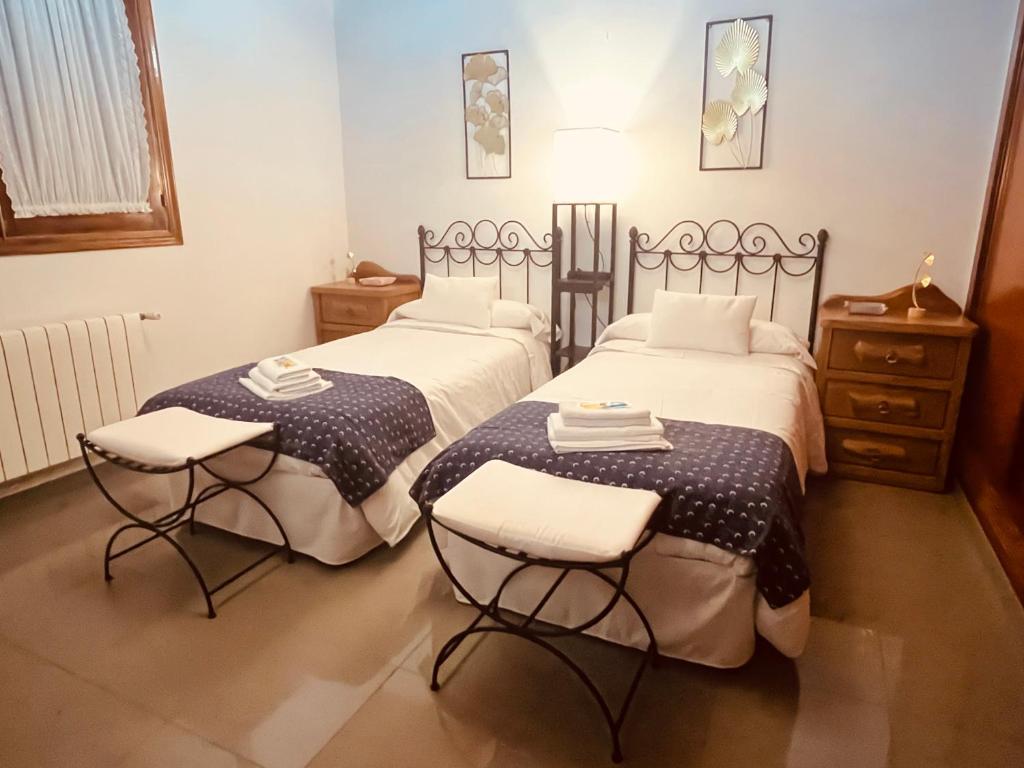 Postel nebo postele na pokoji v ubytování Villa Playa Portomayor BUEU