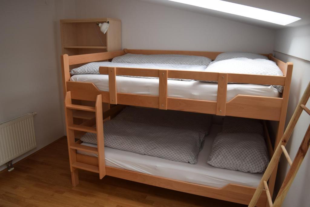 Postel nebo postele na pokoji v ubytování Apartment Alpina