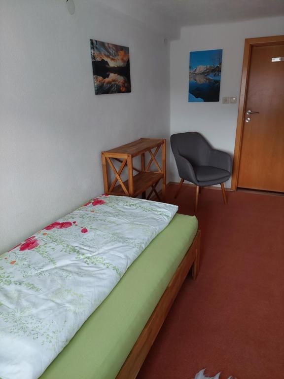 Postel nebo postele na pokoji v ubytování Ferienwohnung Werner Pucher OG
