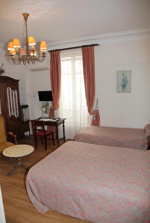 Postel nebo postele na pokoji v ubytování Hotel Cronstadt