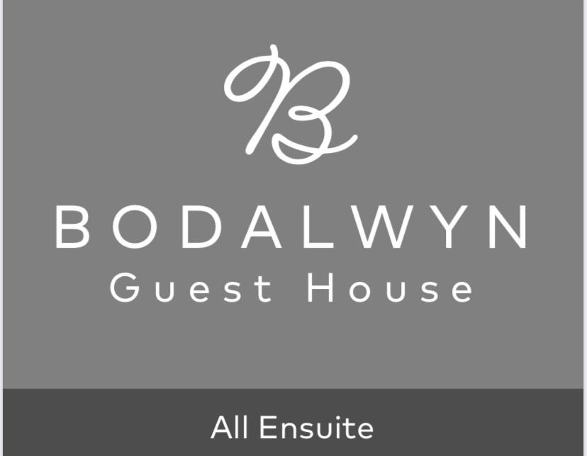 阿伯里斯特威斯的住宿－Bodalwyn Guest House，林地宾馆的标志